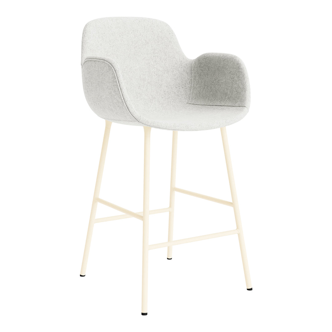 Light gray upholstered bar stool with a smooth, modern design and cream-colored legs.