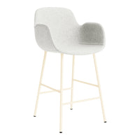 Light gray upholstered bar stool with a smooth, modern design and cream-colored legs.