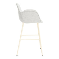 Stylish gray upholstered bar chair with light wood legs, featuring a sleek, modern design. Perfect for contemporary decor.