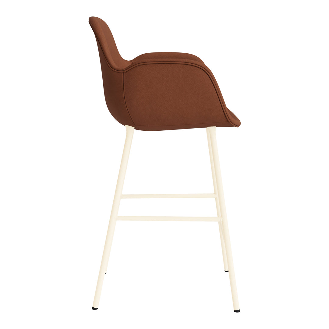Brown upholstered bar stool with a cream-colored base, featuring a sleek, minimalist design and smooth contours.