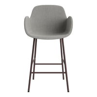 Gray upholstered bar stool with smooth curves and brown metal legs, ideal for modern decor.