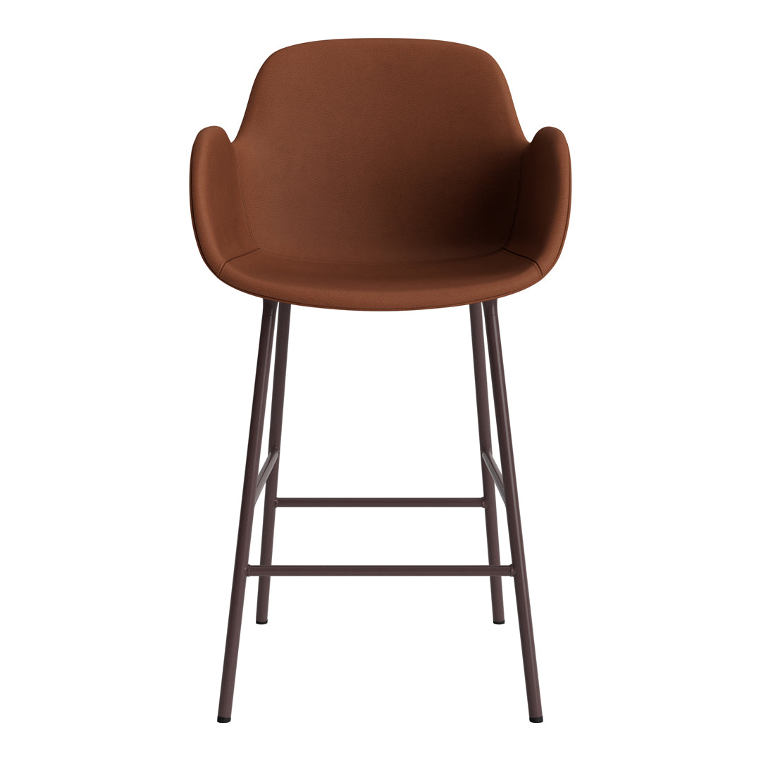Brown upholstered bar stool with a minimalist design and sleek metal legs. Perfect for modern interiors.