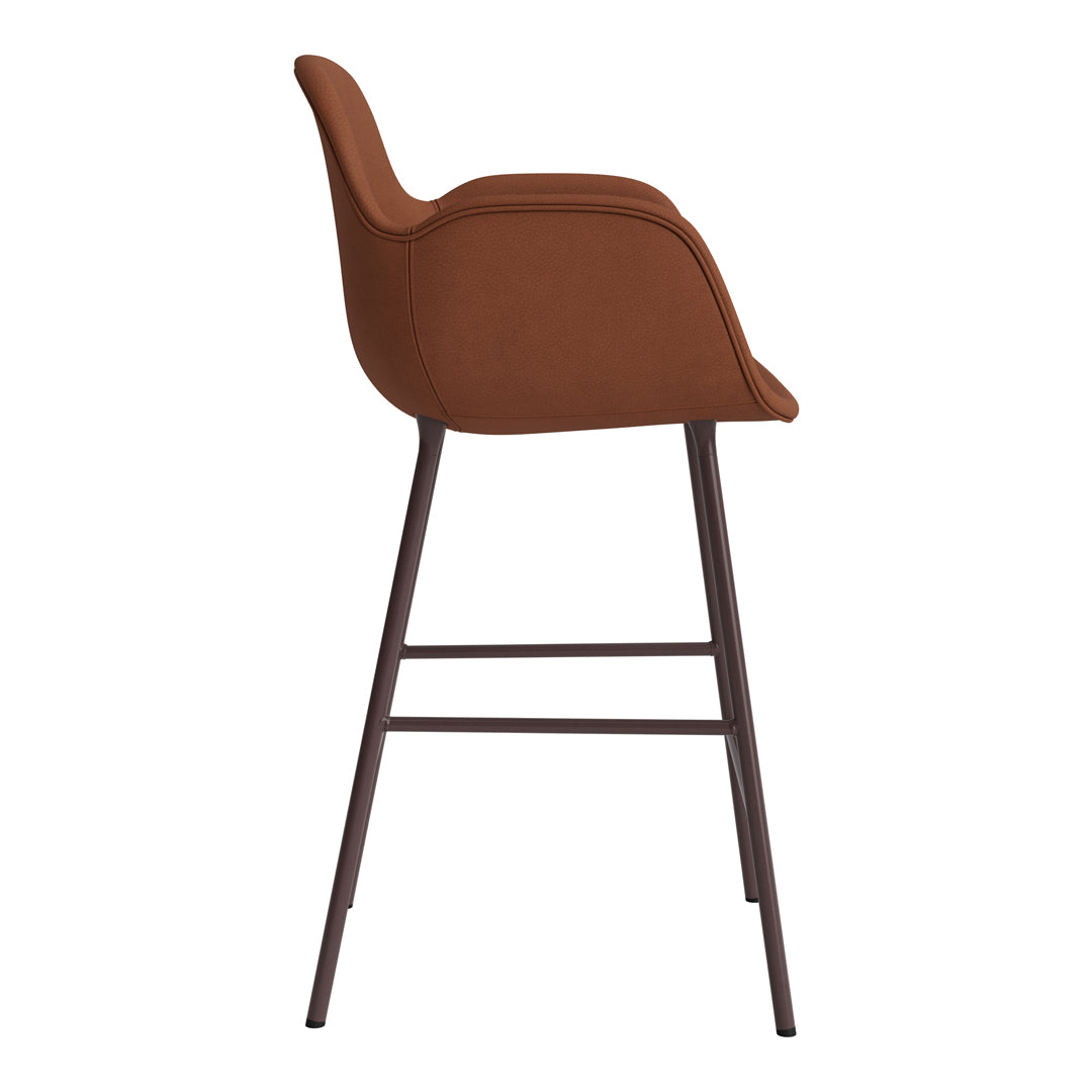 Brown upholstered bar stool with a sleek design and dark metal legs, showcasing a modern and minimal aesthetic.