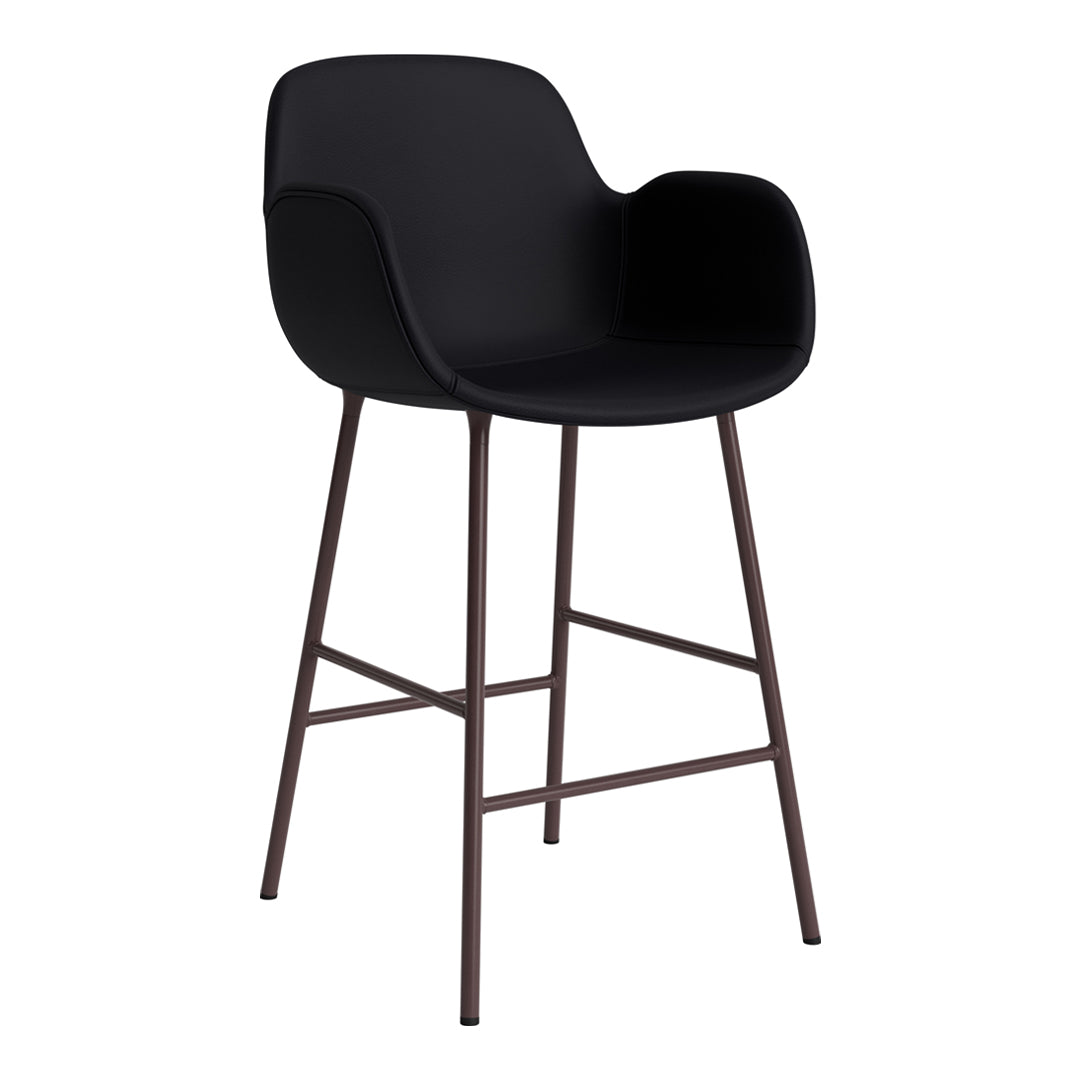 Black upholstered bar stool with sleek curves and a sturdy brown metal frame. Modern and minimalist design.