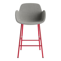 Gray upholstered chair with a modern design, featuring vibrant red metal legs. Perfect for contemporary spaces.