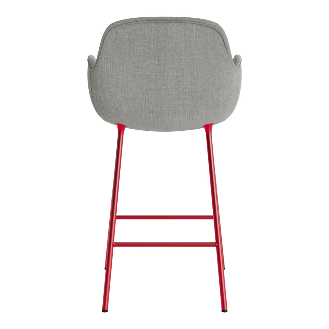 Gray upholstered chair with a sleek design, featuring vibrant red legs for a modern, stylish contrast.