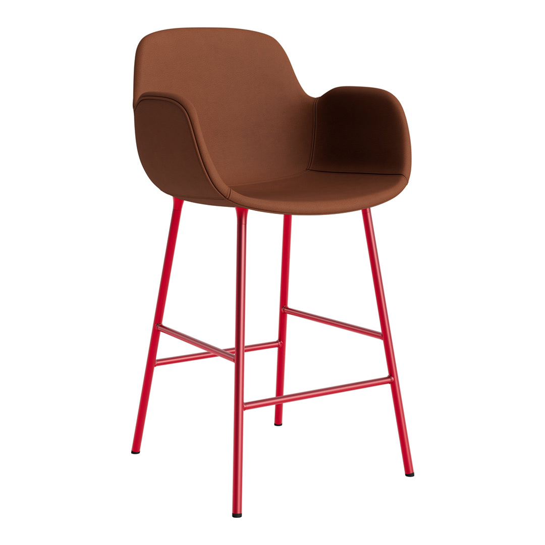 Brown upholstered chair with red metal legs, featuring a modern, minimalist design. Ideal for stylish decor.
