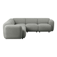 Modern gray sectional sofa with soft, textured fabric and rounded edges, perfect for contemporary living spaces.
