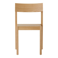 Light oak chair with a smooth, natural finish and minimalist design, featuring a simple, solid pattern.