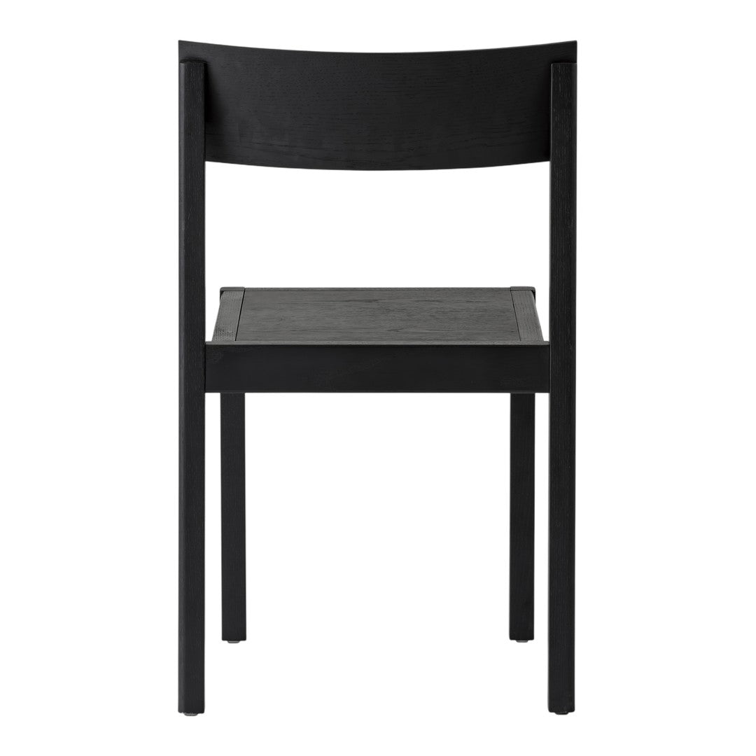 Black wooden chair with a sleek, minimalist design and smooth matte finish. Perfect for modern decor.