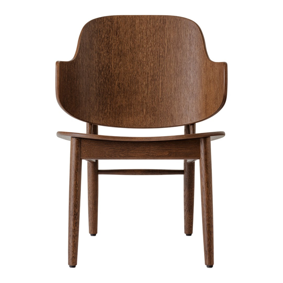 "Solid wood chair in rich brown with a smooth, minimalist design and curved backrest."
