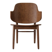 "Solid wood chair in rich brown with a smooth, minimalist design and curved backrest."