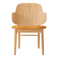 Light wood chair with a smooth natural finish and an orange seat cushion, showcasing a minimalist design.