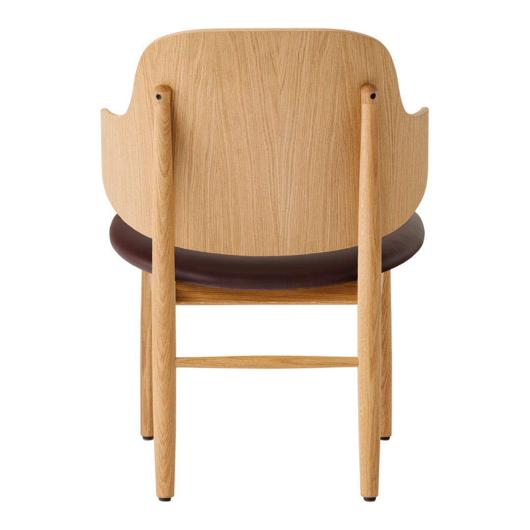Natural oak wood chair with a sleek brown cushion, featuring a minimalist design and smooth, clean lines.