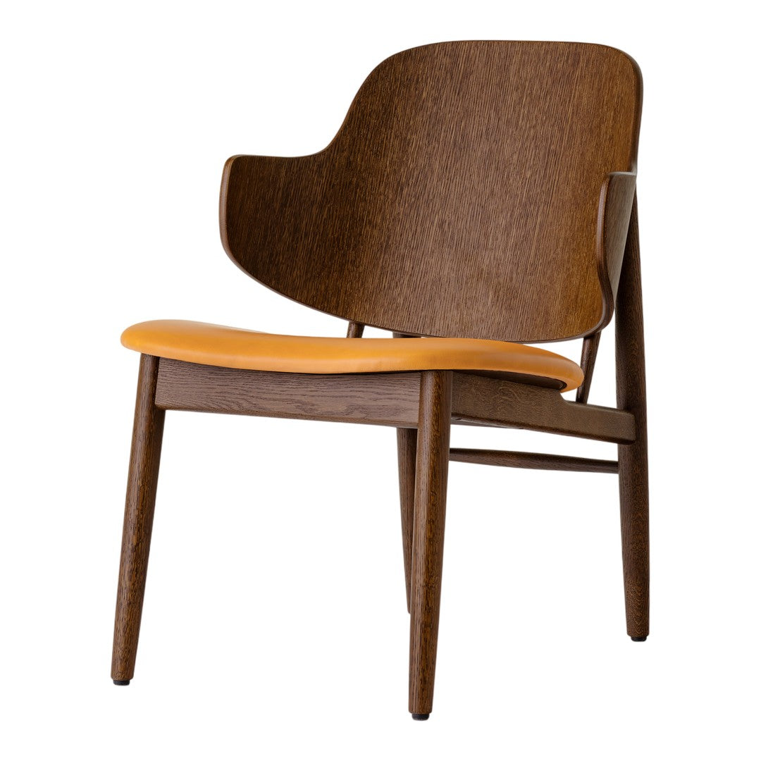 Wooden chair with a rich brown finish and an eye-catching orange seat cushion, featuring sleek minimalist design.