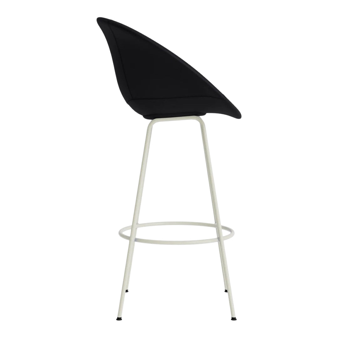 Black upholstered bar stool with a sleek curved design and white metal legs for a modern look.