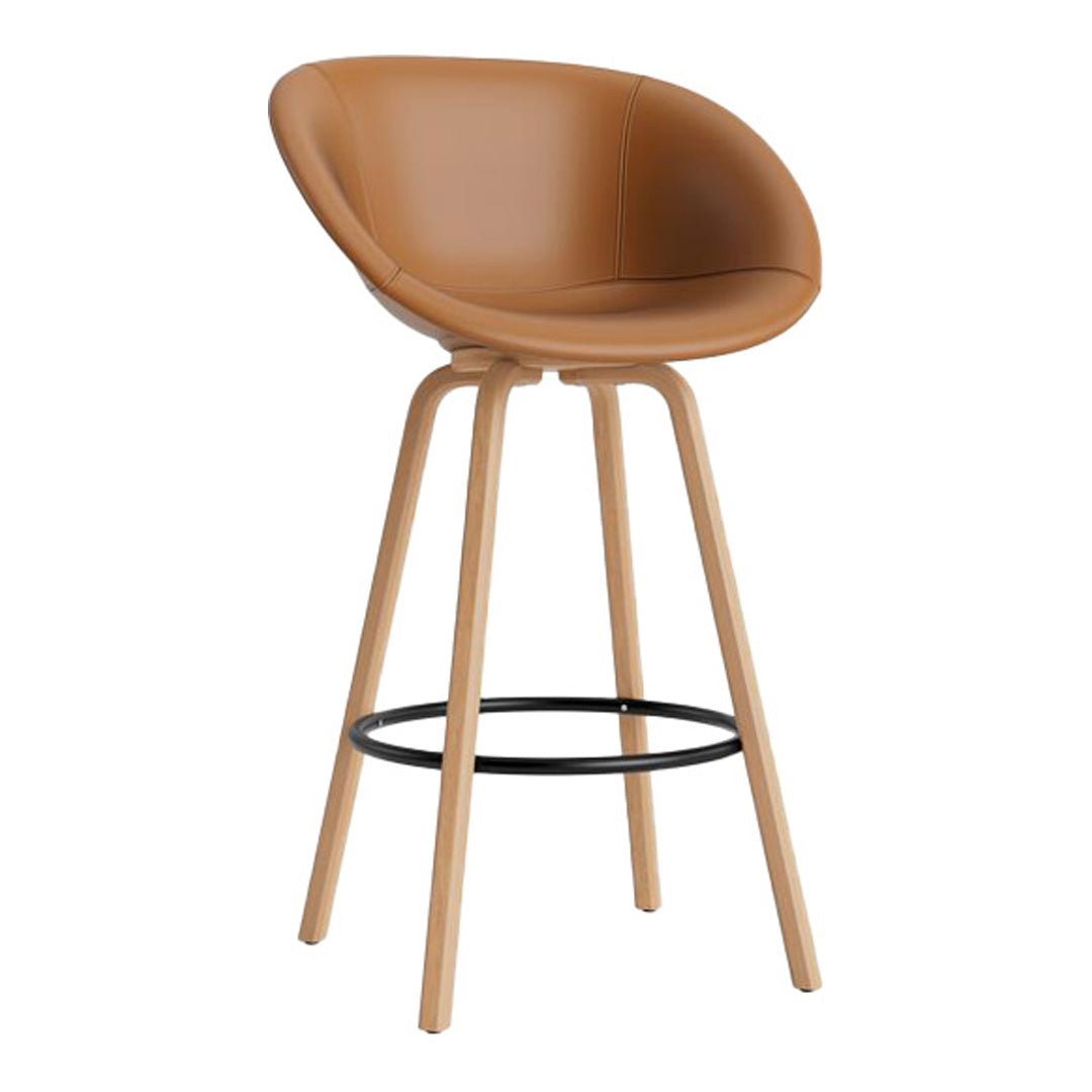 Tan upholstered bar stool with smooth curves and natural wood legs, featuring a minimalist design.