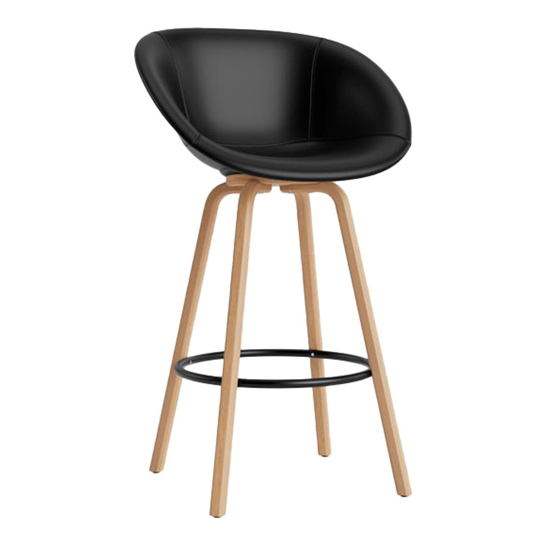 Black upholstered bar stool with a smooth finish and natural wood legs. Modern and minimalist design.