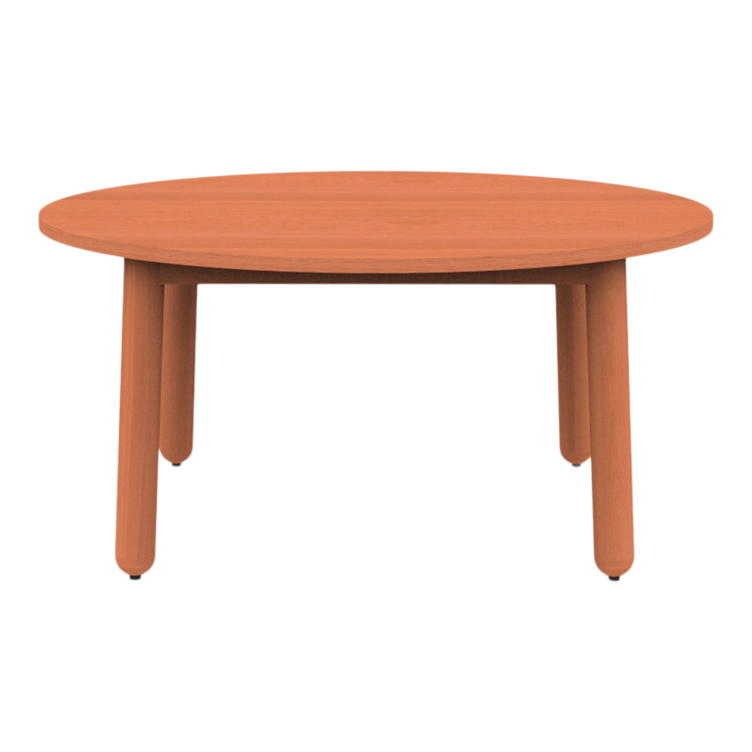 Round coffee table in warm terracotta color with smooth surface and clean legs, adding a modern touch to any space.