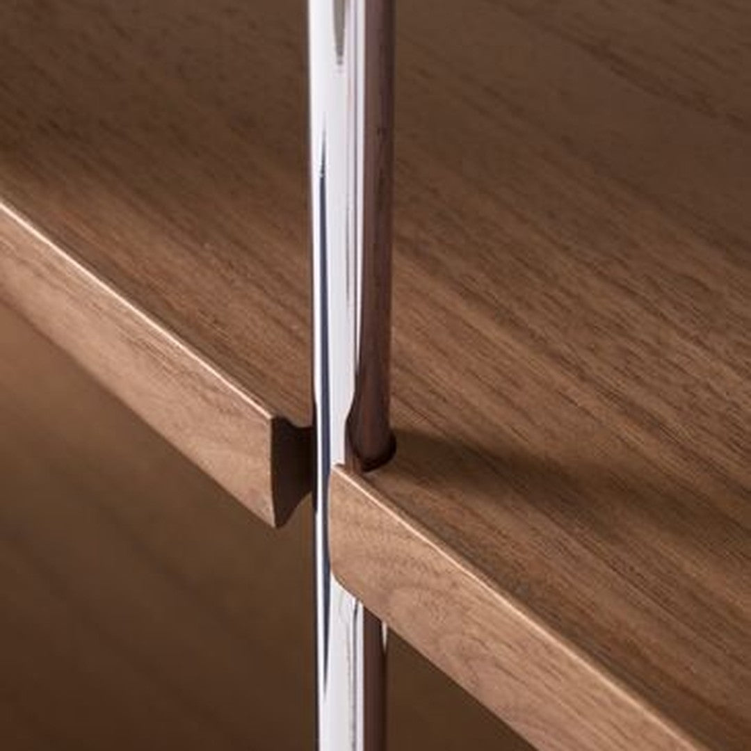 Close-up of smooth wood grain in warm brown tones, contrasted with sleek chrome accents.