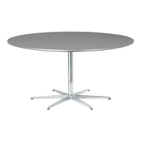 Round grey tabletop with a sleek chrome base, featuring a minimalist design and smooth surface.