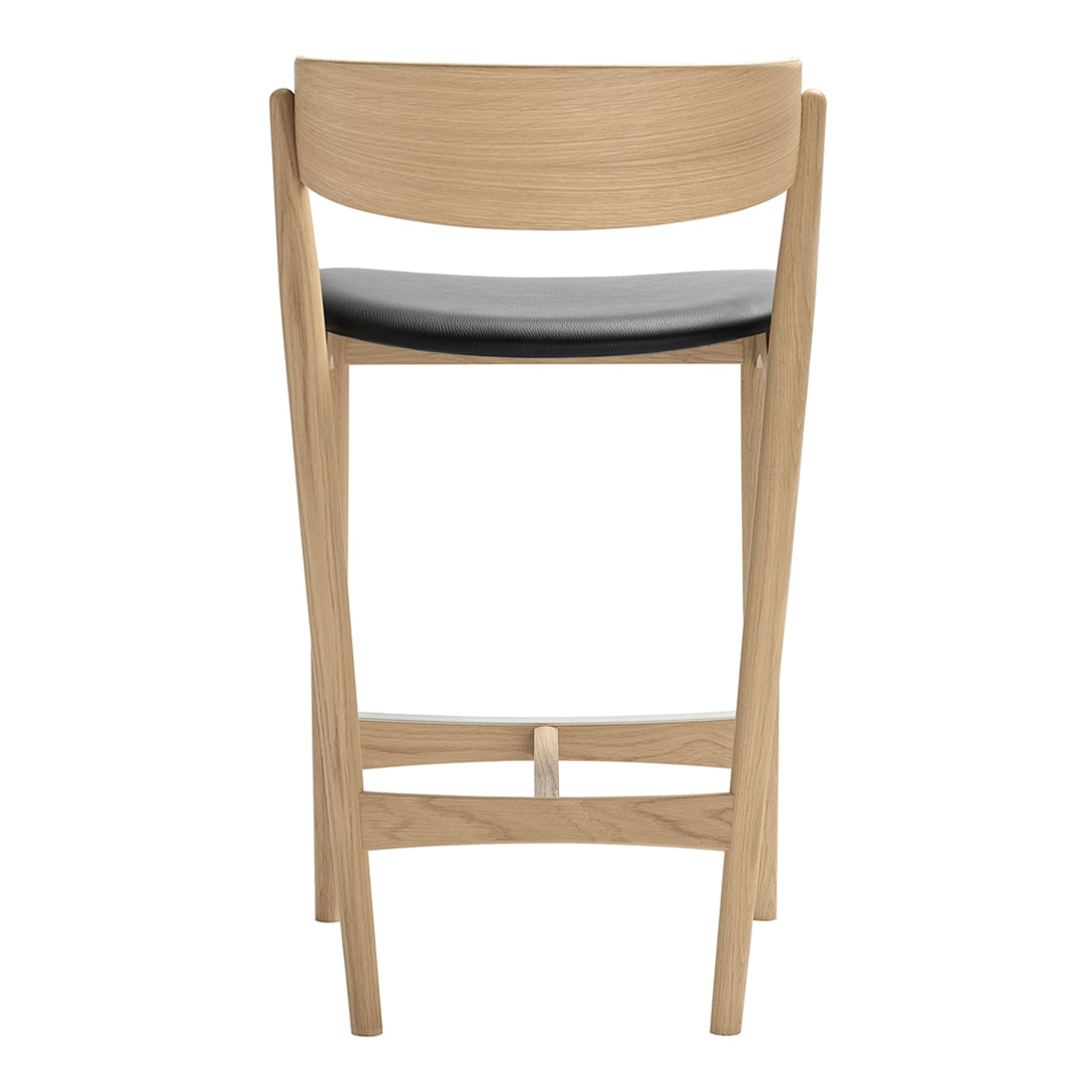 Natural wood bar stool with a sleek black seat, featuring a minimalist design and smooth finishes.