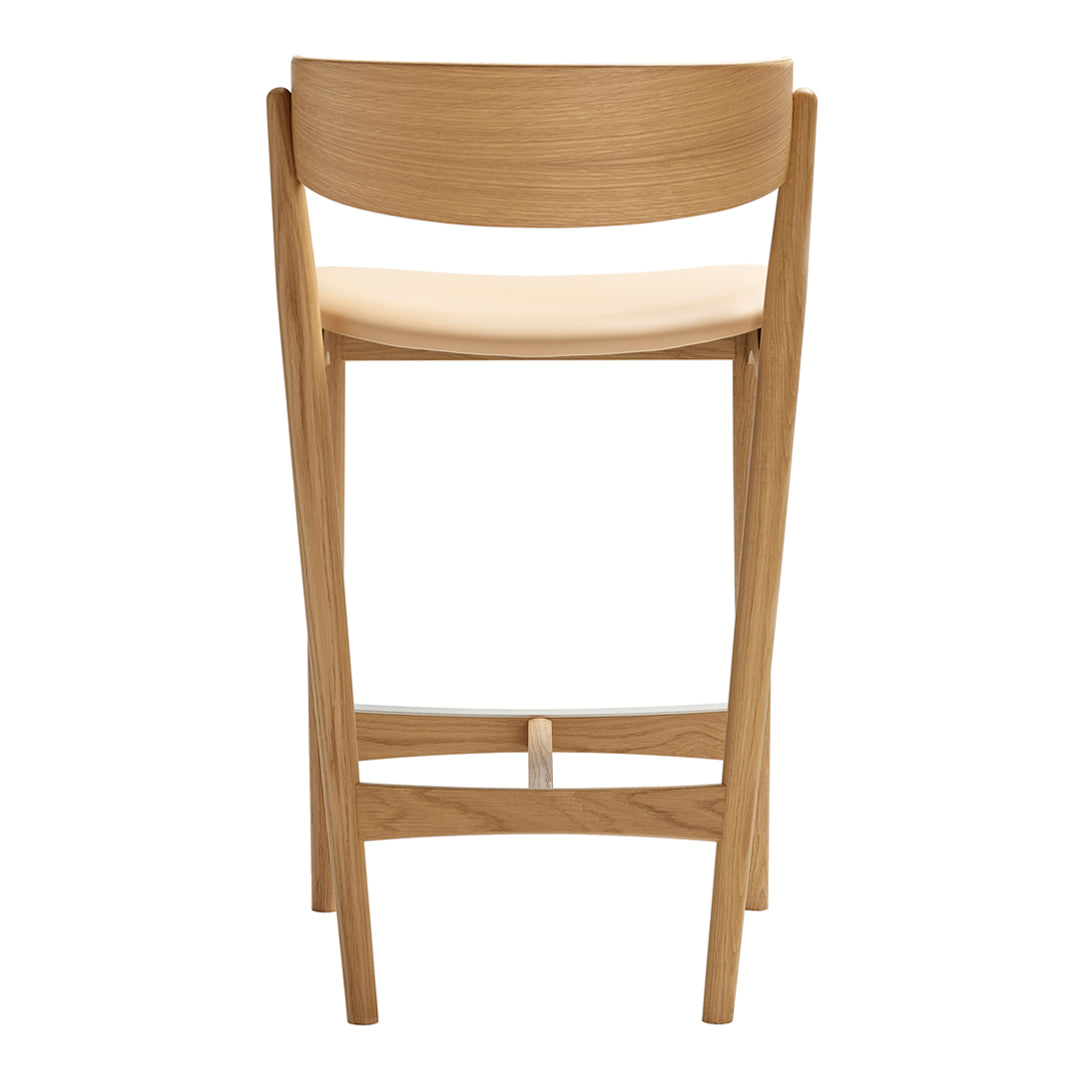 Natural wood bar chair with a light cream padded seat and smooth, minimalist design, perfect for modern decor.