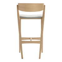 Natural wood bar stool with a light gray upholstered seat and a smooth, minimalist design.