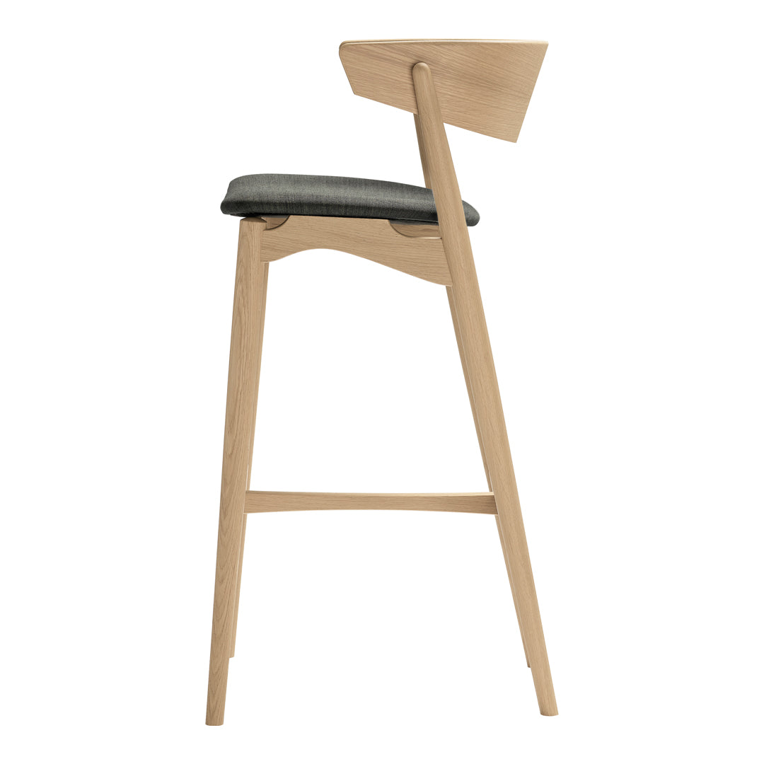Light wood bar stool with a gray upholstered seat, featuring a sleek, minimalist design and clean lines.