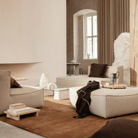 Neutral beige and cream furniture with brown accents, featuring soft textures and elegant, minimalist design.