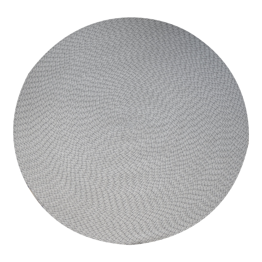 Gray circular mat with a textured swirl pattern, ideal for modern decor.