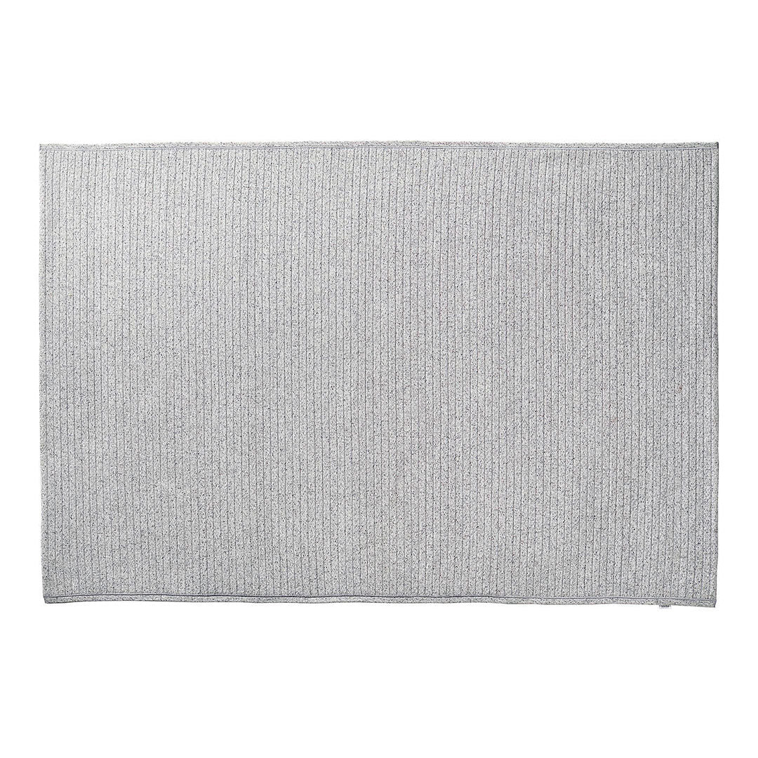 Light gray textured rug with subtle vertical stripes, perfect for modern décor.