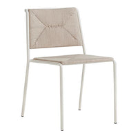 Beige geometric patterned chair with white metal legs, perfect for modern decor.