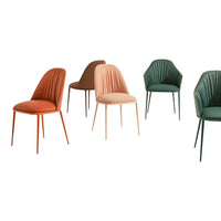 Set of upholstered chairs in earthy tones: terracotta, blush, olive green, and brown with ribbed detailing.