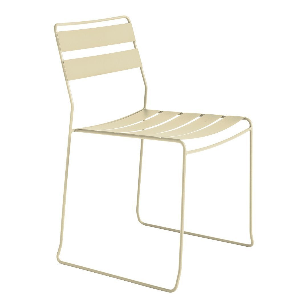 Cream-striped metal chair with a sleek, minimalist design, perfect for modern decor.
