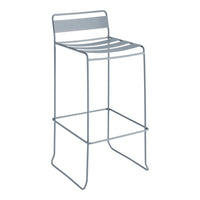 Light gray metal bar stool with minimalist slatted design, perfect for modern decor.