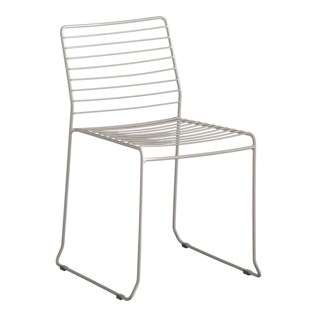 Minimalist silver dining chair with horizontal strip pattern, ideal for modern decor.