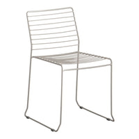 Minimalist silver dining chair with horizontal strip pattern, ideal for modern decor.
