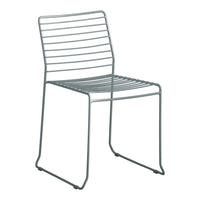 Gray striped metal chair with a sleek, minimalist design and open pattern for modern decor.