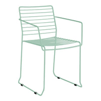 Mint green wire chair with a sleek, modern design and horizontal striped pattern. Perfect for contemporary decor.