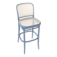 Light blue bar stool with a woven rattan seat and backrest, featuring a sleek, modern design and minimalist aesthetic.