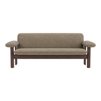 Textured brown fabric couch with sleek wood armrests, ideal for a modern living space.