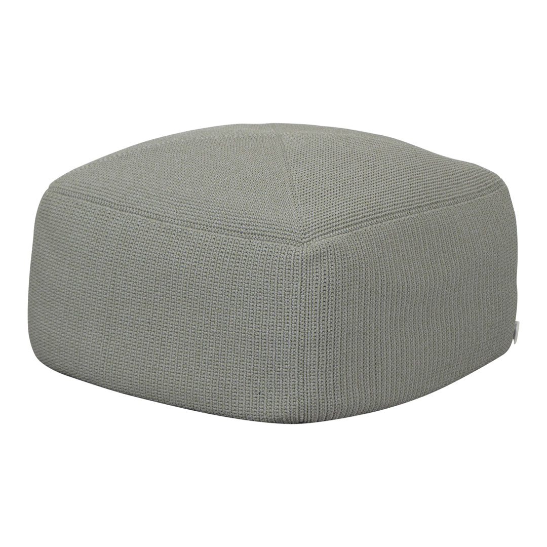 Gray textured pouf with a subtle ribbed pattern for a modern, minimalist aesthetic. Perfect for any decor.