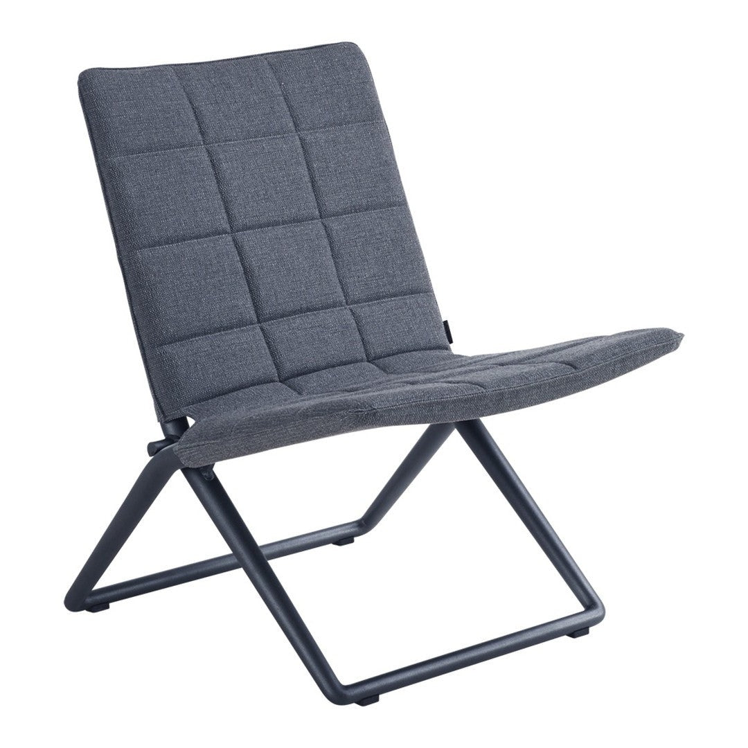 Gray upholstered chair with a quilted pattern, featuring a sleek black metal frame. Perfect for modern decor.
