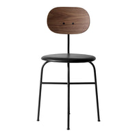 Black metal chair with a walnut wood backrest, featuring a sleek, minimalist design and natural wood grain pattern.