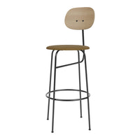 Wooden bar stool with natural oak finish, tan seat, and sleek black metal legs for a modern look.