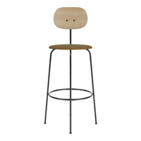 Modern bar stool featuring a light wood seat and back, with a dark metal frame and a warm brown, textured cushion.
