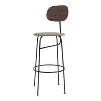 Modern bar stool featuring a dark wooden backrest, beige seat, and sleek black metal legs for a stylish look.