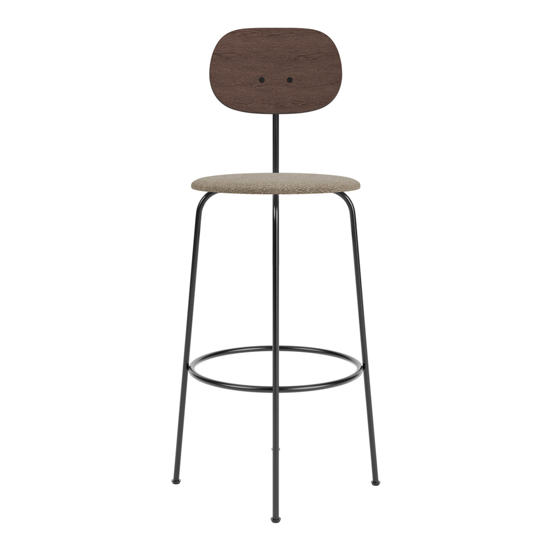 Stylish bar stool in dark wood, beige seat fabric, and black metal legs, featuring a minimalist design.