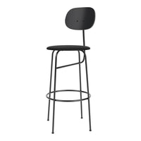 Sleek black bar stool with smooth, matte finish and minimalist design, featuring a round seat and curved backrest.